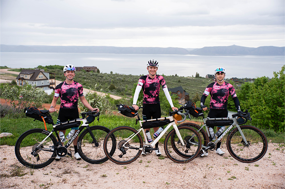 riders standing behind bikes