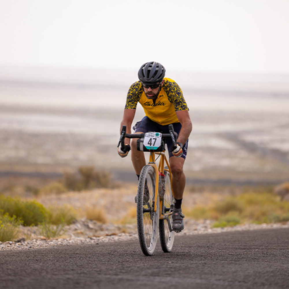 person racing bike