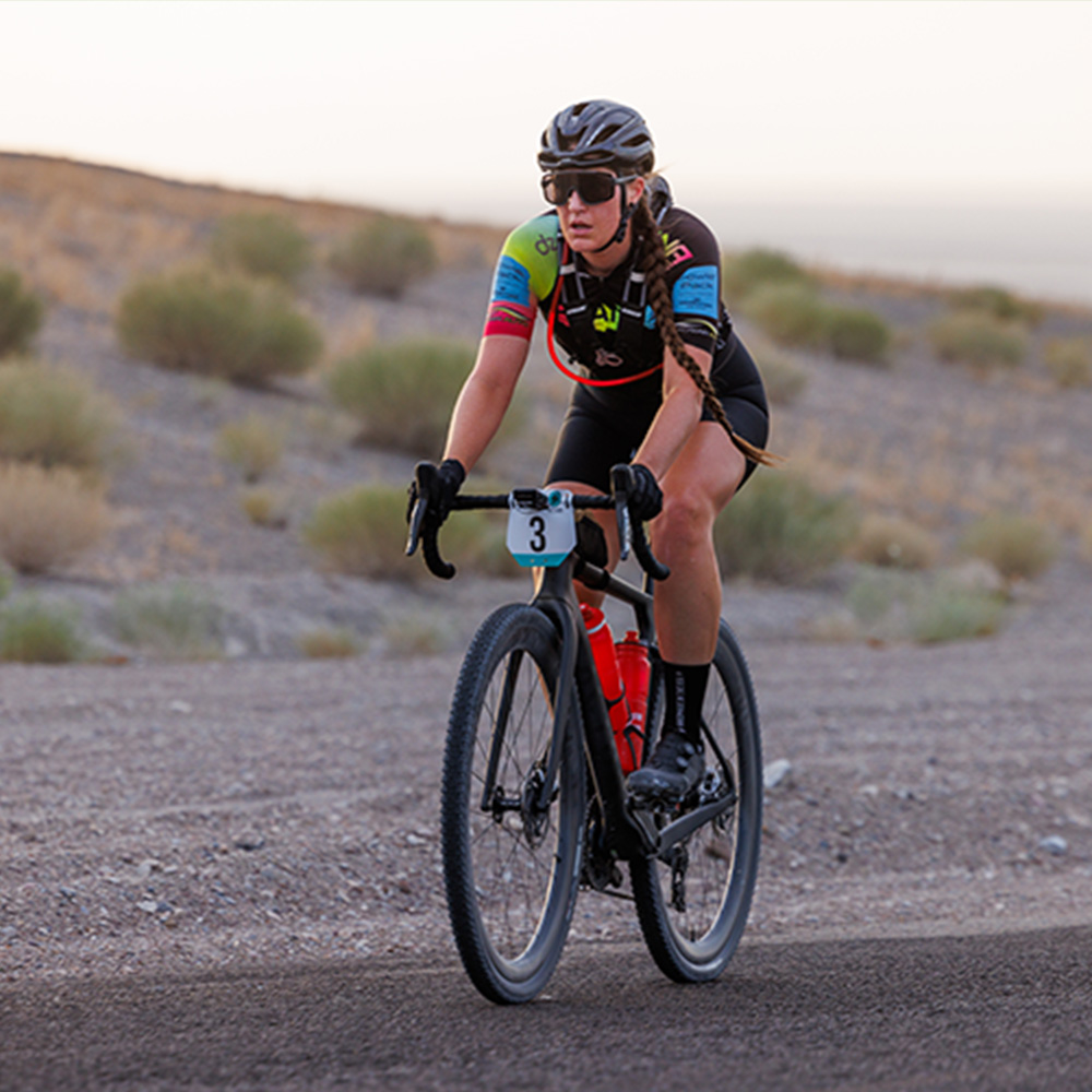 person racing bike